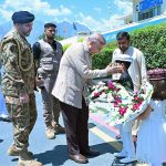 Prime Minister Muhammad Shehbaz Sharif being presented a floral bouquet at Gilgit Airport upon his arrival in Gilgit-Baltistan on his day long visit