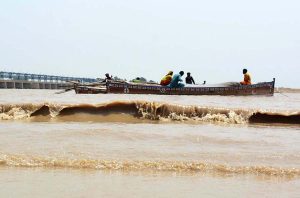 A view of the waves in the Indus River after increased water levels due to heavy monsoon rains in the country.