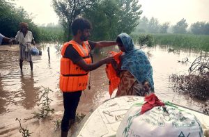 Rescue 1122 personnel evacuate residents from flood-hit areas to safer locations after the River Chenab overflowed, as rising water levels triggered by heavy rains and the opening of Indian floodgates crossed the danger mark.