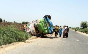 A view of truck turned turtle due to over speed, driver is injured in this incident. APP/TZD