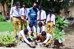 Students busy creating paintings during the 78th Independence Day Marka-e-Haq celebration painting competition at a local school.