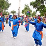 Sindhi artists perform traditional dance at the inaugural ceremony of the Special Azadi Train from Karachi to Tharparkar, held to mark Independence Day and Marka-e-Haq celebrations