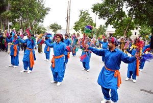 Sindhi artists perform traditional dance at the inaugural ceremony of the Special Azadi Train from Karachi to Tharparkar, held to mark Independence Day and Marka-e-Haq celebrations