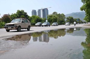 A view of rain water accumulated on road after heavy rain that experiences the Federal Capital.