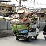 An overloaded pickup van carrying cardboard at Khayaban area in the city poses a risk of accidents and needs the attention of the concerned authorities