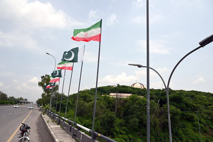 Roads adorned with flags, extending a warm welcome to Iran’s President of Iran Dr. Masoud Pezeshkian and fostering Pakistan-Iran friendship