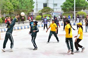 Players are in action in volleyball match during Independence Day Marka-e-Haq celebration Athletes Championship at Public School, Sports Complex.