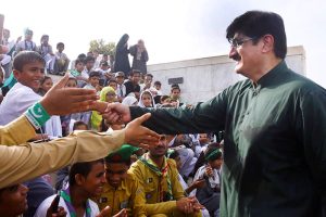 Sindh Chief Minister Syed Murad Ali Shah interacts with schoolchildren at the Mazar-e-Quaid commemorating the 78th Independence Day of Pakistan
