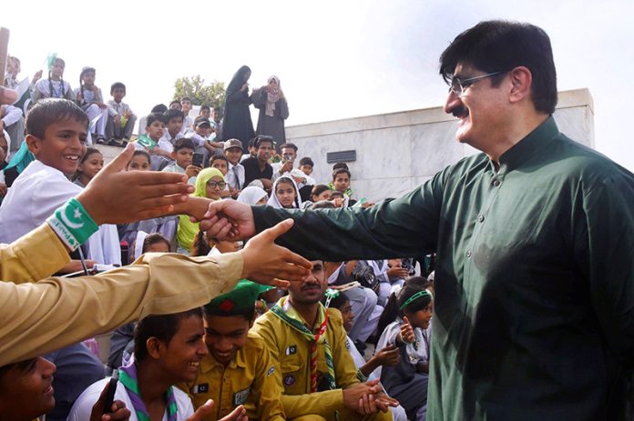Sindh Chief Minister Syed Murad Ali Shah interacts with schoolchildren at the Mazar-e-Quaid commemorating the 78th Independence Day of Pakistan