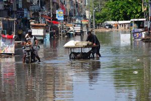 A view of railway tracks submerged in rainwater due to heavy rainfall in the city.