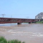 Severe flooding turned Chenab river into an ocean of raging water, flowing under the bridge, highlighting the severity of the floods in Chiniot district.