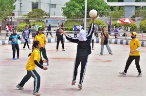 Players are in action in volleyball match during Independence Day Marka-e-Haq celebration Athletes Championship at Public School, Sports Complex.