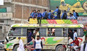 Students travelling on rooftop of passenger bus at Tralai may cause any misshape and needs the attention of concerned authorities.