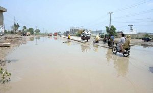 Gypsies huts submerged in rainwater at Makki Shah area.