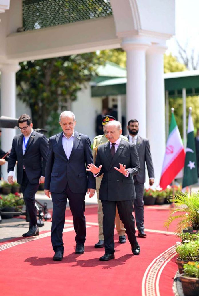 Prime Minister Muhammad Shehbaz Sharif receives the President of Iran H.E. Dr. Masoud Pezeshkian at the Prime Minister's House