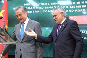 Deputy Prime Minister/Foreign Minister Senator Mohammad Ishaq Dar shakes hand with Chinese Foreign Minister Wang Yi at Ministry of Foreign Affairs.