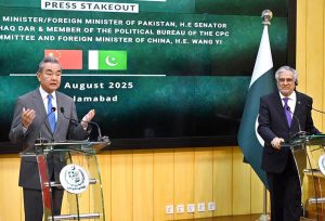Deputy Prime Minister/Foreign Minister Senator Mohammad Ishaq Dar shakes hand with Chinese Foreign Minister Wang Yi at Ministry of Foreign Affairs.
