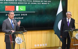 Deputy Prime Minister/Foreign Minister Senator Mohammad Ishaq Dar shakes hand with Chinese Foreign Minister Wang Yi at Ministry of Foreign Affairs.