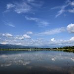 A picturesque view of clouds reflecting in the water at Rawal Dam in the Federal Capital