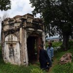 A view of the historic Kuri Baradari located at Kuri Village, believed to have been built during the reign of Maharaja Ranjit Singh (1799–1840). The octagonal structure, set on an elevated plinth, features foliated pillars, arched entrances from four directions, and a staircase of eleven steps on its eastern side. Traces of Sikh-era frescoes—depicting Guru Nanak with companions Bala and Mardana—can still be seen on its inner and outer walls, despite defacement and deteriorating plaster. The ceiling remains adorned with fading floral designs and a Gurmukhi inscription is visible on the western outer panel