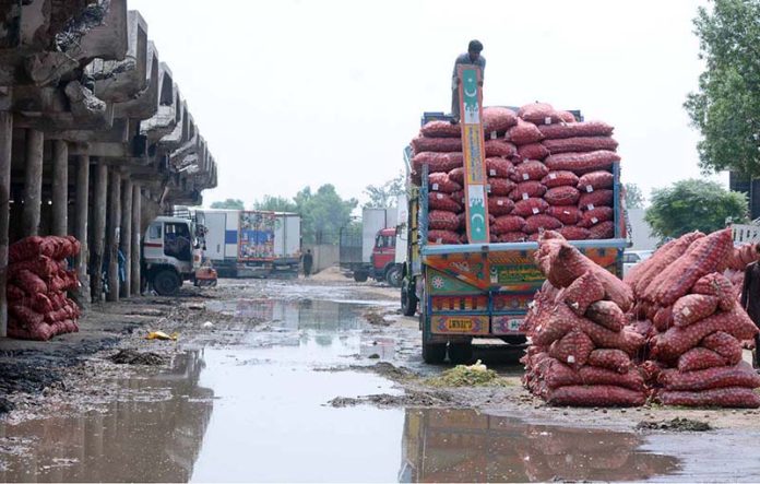 A view of rainwater accumulated at Vegetable Market after rain that experienced the city