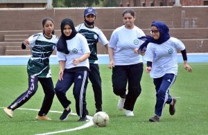Player participate in short put throw competition during Independence Day Marka-e-Haq celebration Athletes Championship at Public School, Sports Complex.