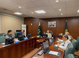 Federal Minister for Maritime Affairs Muhammad Junaid Anwar Chaudhry presiding over a pre-board meeting briefing by acting KPT Chairman, Rear Admiral Ateeq-ur-Rehman.