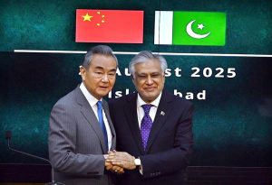 Deputy Prime Minister/Foreign Minister Senator Mohammad Ishaq Dar shakes hand with Chinese Foreign Minister Wang Yi at Ministry of Foreign Affairs.