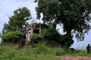 A view of the historic Kuri Baradari located at Kuri Village, believed to have been built during the reign of Maharaja Ranjit Singh (1799–1840). The octagonal structure, set on an elevated plinth, features foliated pillars, arched entrances from four directions, and a staircase of eleven steps on its eastern side. Traces of Sikh-era frescoes—depicting Guru Nanak with companions Bala and Mardana—can still be seen on its inner and outer walls, despite defacement and deteriorating plaster. The ceiling remains adorned with fading floral designs and a Gurmukhi inscription is visible on the western outer panel
