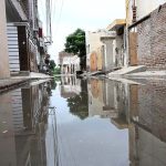 A view of stagnant sewage water accumulated in the street at Tiwana Park due to a choked drainage system; it needs the attention of the concerned authorities