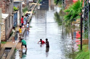 A view of rainwater accumulated on the road outside Railway Station due to heavy rain in the city.