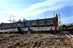 A welder is busy welding a newly installed pipeline at the 10th Avenue flyover as part of ongoing development work in the Federal Capital