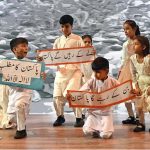 Students perform a tableau on a national song during the Marka-e-Haq and 78th Independence Day celebrations organized by the Workers Welfare Fund at the National Library Auditorium