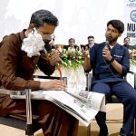 Students perform a tableau during the Workshop and Medical Undergraduate Research Conference organized by Liaquat University of Medical & Health Sciences (LUMHS), Jamshoro