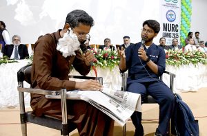 Students perform a tableau during the Workshop and Medical Undergraduate Research Conference organized by Liaquat University of Medical & Health Sciences (LUMHS), Jamshoro