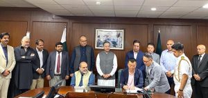 Federal Minister for Maritime Affairs, Muhammad Junaid Anwar Chaudhry witnessing signing of Letter of Intent (Lol) by Chinese firm.