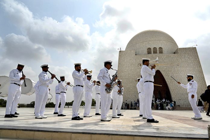 Pakistani Naval Band performing the national anthem at the mausoleum of the country's founding father, Muhammad Ali Jinnah, during the 78th Independence Day celebrations