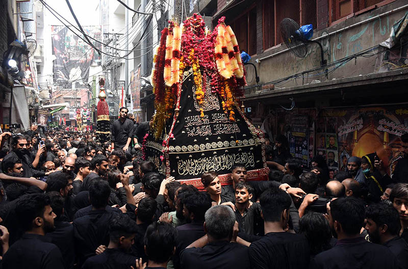 A large number of mourners attend the Chehlum procession commemorating ...