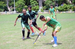 A tug-of-war match between Commissioner-XI and Government College University Faisalabad-XI, held in connection with the Independence Day and ‘Maarka-e-Haq’ Sports Competition at the GCUF hockey ground.