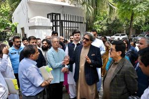 Chairman Senate Housing Committee, Senator Nasir Butt, chairs a meeting regarding illegal occupants of government-owned property at various locations, accompanied by Senators Pervaiz Rashid and Niaz Khan at Chamba House.