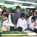 Sindh Chief Minister Syed Murad Ali Shah cuts a cake with differently-abled children to celebrate the upcoming Independence Day at the Marka-e-Haq event held at Quaid-e-Azam House Museum