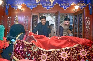 Governor KPK Faisal Karim Kundi and Sindh Minister for Culture and Tourism Zulfiqar Ali Shah listen to traditional kalam at the shrine of Hazrat Shah Abdul Latif Bhitai during the 282nd Urs celebrations