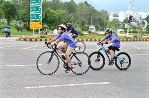 Participants taking part in Azadi Cycling Championship organized by the Directorate of Municipal Administration and Sports Directorate CDA at D-Chowk in the Federal Capital
