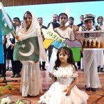 Students present a tableau portraying the partition era and the struggle of Fatima Jinnah, Mother of the Nation, during the Marka-e-Haq and 78th Independence Day celebrations organized by the Workers Welfare Fund at the National Library Auditorium