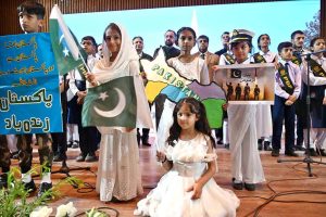 Students present a tableau portraying the partition era and the struggle of Fatima Jinnah, Mother of the Nation, during the Marka-e-Haq and 78th Independence Day celebrations organized by the Workers Welfare Fund at the National Library Auditorium