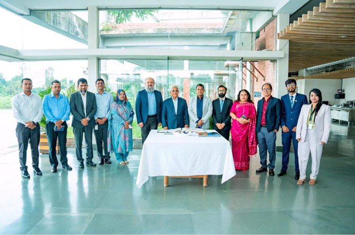 Federal Minister for Commerce, H.E. Jam Kamal Khan, in a group photo with the Managing Director and senior management of Square Pharmaceuticals PLC during his visit to the company