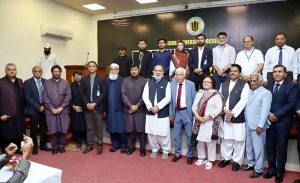 Federal Minister for Investment & Chairman Board of Investment Qaiser Ahmed Sheikh talking to media persons during post budget seminar 2025-26 at ISRA University.