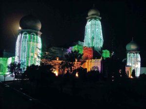 Government buildings, public squares, and private premises illuminated with vibrant decorative lights in connection with Independence Day celebrations