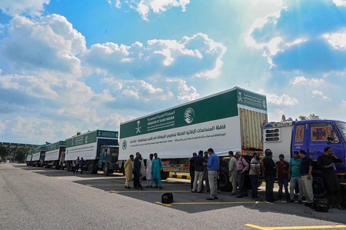 A view of Saudi aid containers during the handing-over ceremony of flood relief assistance to PDMA for flood-affected people of Khyber Pakhtunkhwa by King Salman Humanitarian Aid and Relief Centre at the Sports Complex, Islamabad
