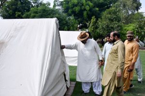 Federal Minister and Chairman Parliamentary Committee Kashmir Affairs Rana Mohammad Qasim Noon is visiting the camps for flood affectees at Jalalpur Pir Wala